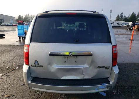 2010 Dodge Grand Caravan Sxt z USA, uszkodzony, nr VIN 2D4RN5D1XAR207644